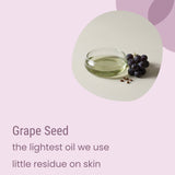 A small glass bowl of grapeseed oil rests beside a cluster of grapes and seeds on a light surface. Text: “Biotaderm Flow Oily Sensitive Light Moisturiser is made with grape seed—our lightest oil, leaving little residue on skin. The ideal choice for oily, sensitive skin.”.